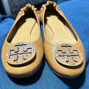 Used Tory Burch medalion flats